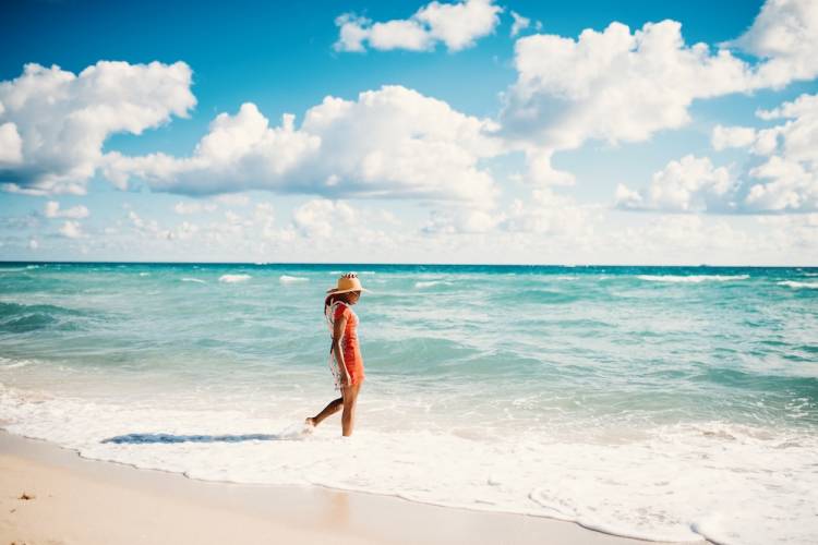 woman walking on beach